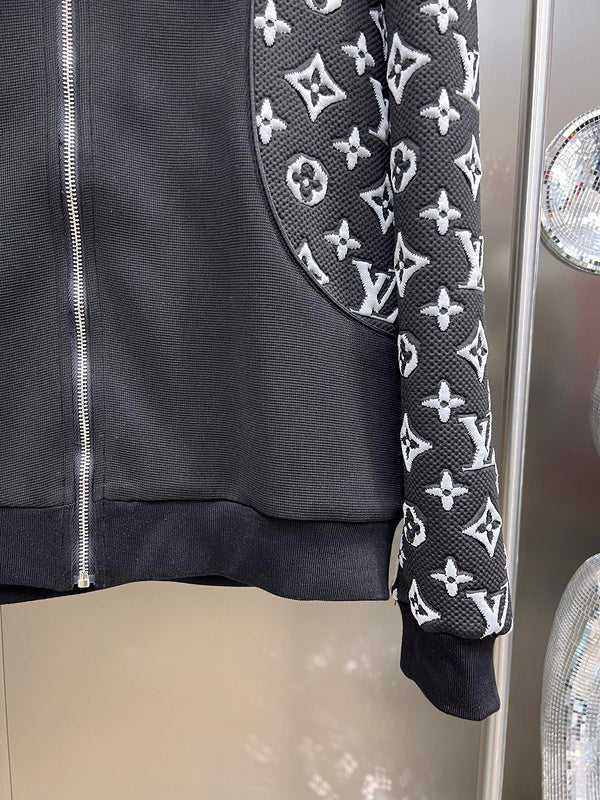 Front view of Louis Vuitton luxury clothing with label-forward styling