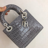 Front view of signature sleek women's handbag – women's designer-style accessory