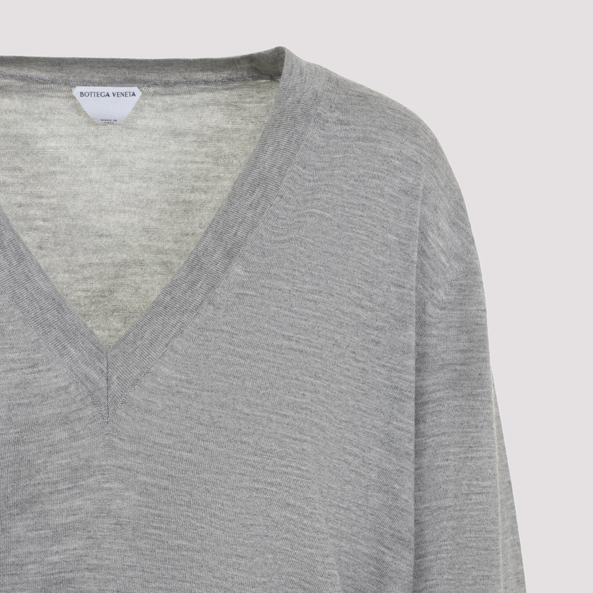 Close-up of Bottega Veneta sweaters & pullovers hardware and fine stitching
