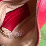 Handle and strap detail of polished signature women's handbag – women's luxury handbag