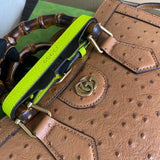 Styled lifestyle shot of sleek polished women's handbag – women's luxury handbag