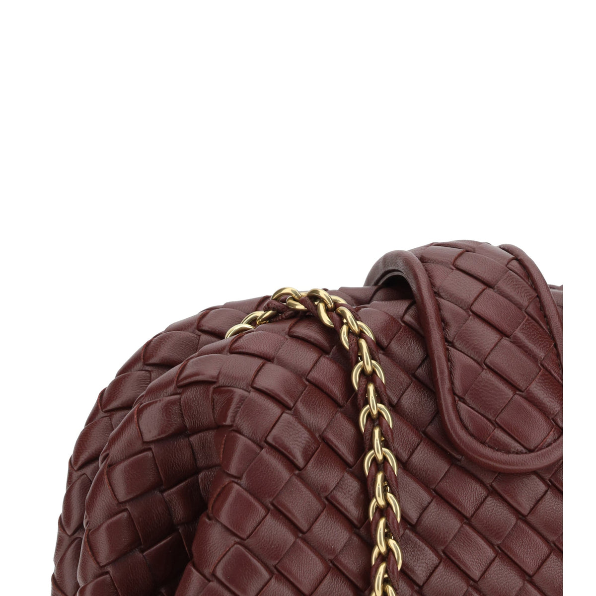 Close-up of Bottega Veneta clutches hardware and fine stitching