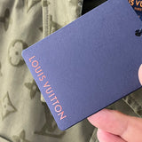 Flat lay presentation of Louis Vuitton luxury clothing with runway-inspired design
