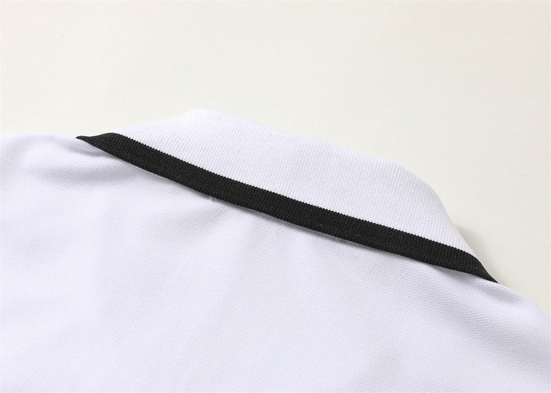Flat lay presentation of Polo cotton polo shirt with logo-detail design