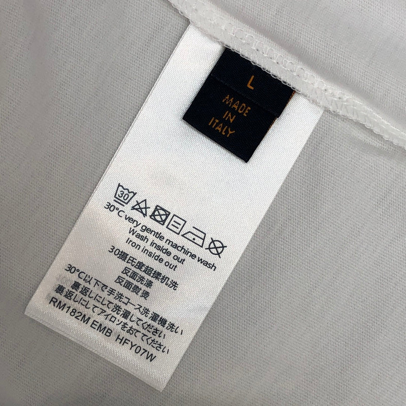 Flat lay presentation of Louis Vuitton cotton t-shirt with logo-detail design