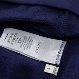 Close-up detail shot of Gucci luxury clothing with tailored silhouette