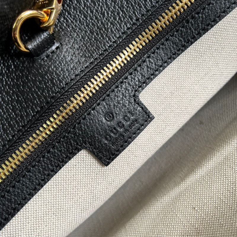 Side profile of sleek everyday-luxe women's handbag – women's luxury handbag
