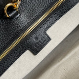 Side profile of sleek everyday-luxe women's handbag – women's luxury handbag