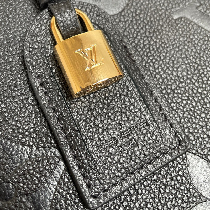 Handle and strap detail of refined signature women's handbag – women's designer-style accessory