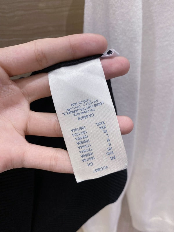 Close-up detail shot of Louis Vuitton luxury clothing with streetwear-inspired cut