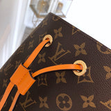 Side profile of structured polished women's handbag – women's premium purse