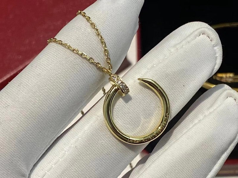 Side view of Cartier unisex jewelry piece