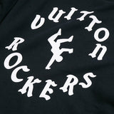 Back view of Louis Vuitton luxury clothing with label-forward styling