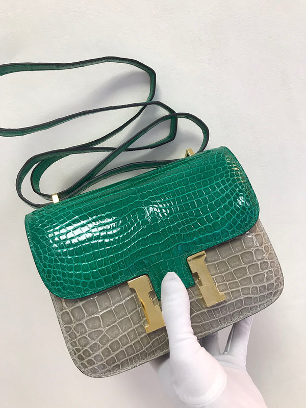 Side view of poised structured handbag