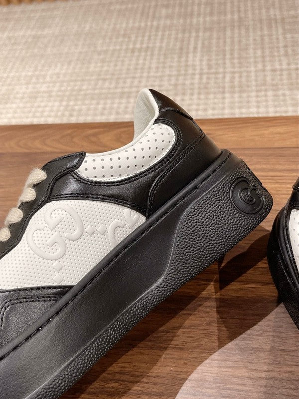 Gucci sneakers detailed view showing premium designer craftsmanship