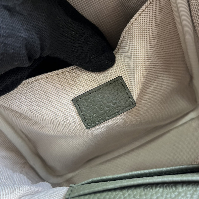 Close-up detail of classic sleek women's handbag – women's designer-style accessory
