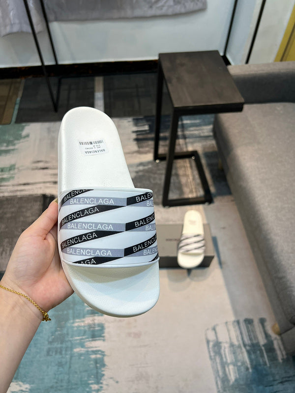 Balenciaga Black Flat Thong Sandals - Heel Detail View
