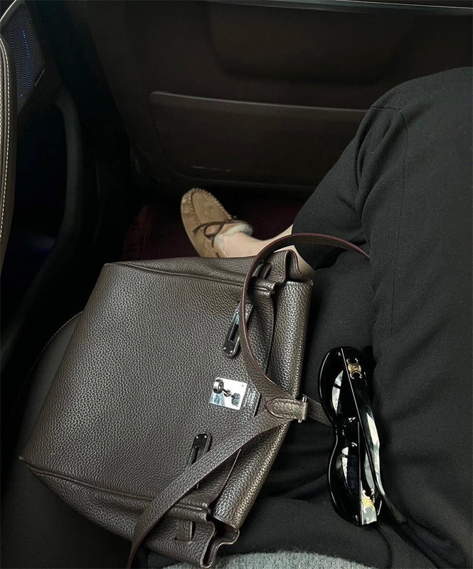  Structured handbag carried on shoulder