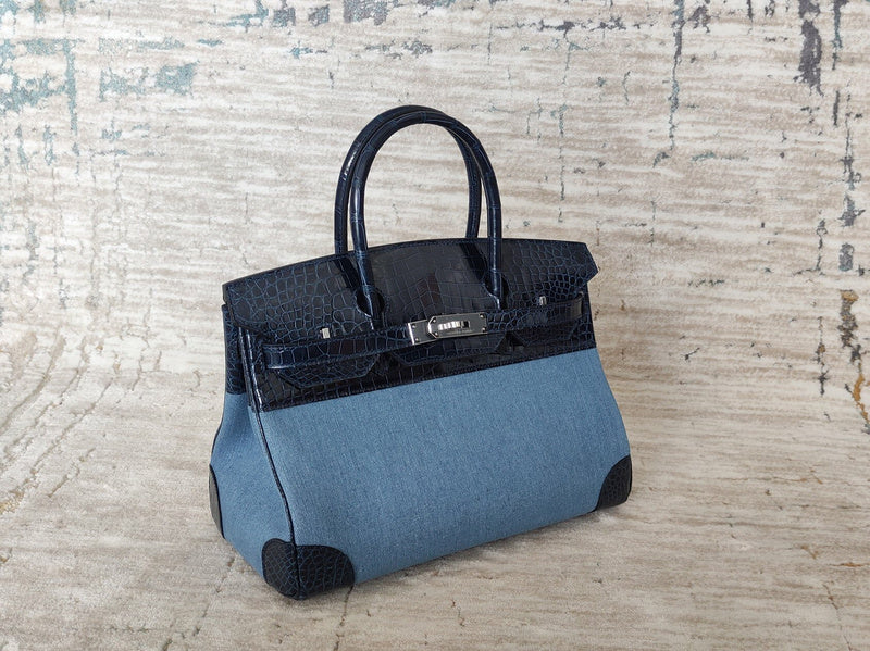Side view of sleek structured handbag