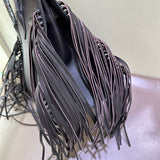  understated satchel detail view showing craftsmanship