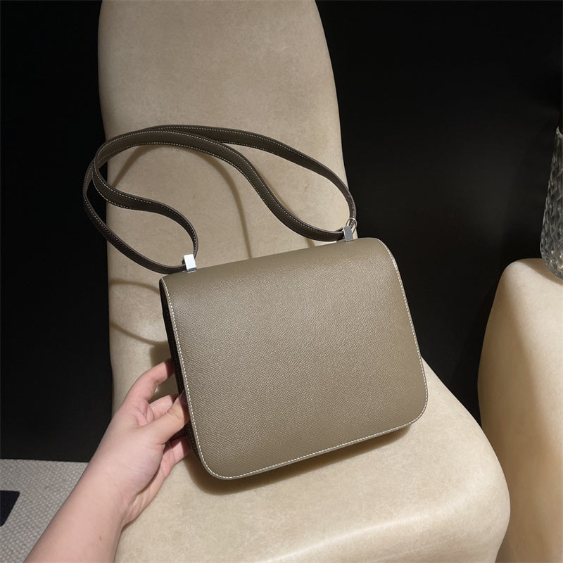Side view of clean-lined structured handbag