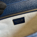 Side profile of elevated classic women's handbag – women's luxury accessory