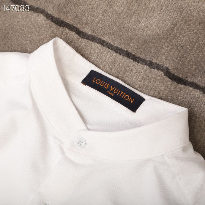 Front view of Louis Vuitton luxury clothing with tailored silhouette