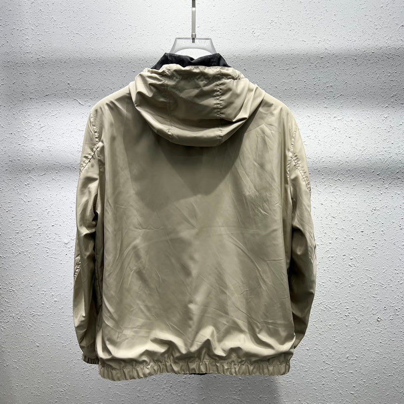 Close-up detail shot of Louis Vuitton luxury clothing with runway-inspired design
