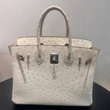 Side view of structured structured handbag