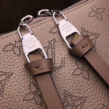 Back view of statement premium women's handbag – women's luxury accessory