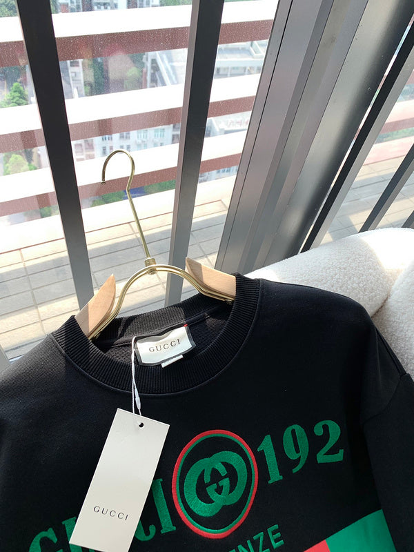 Front view of Gucci luxury clothing with monogram-inspired silhouette