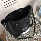 Close-up detail of polished chic women's handbag – women's designer-style accessory
