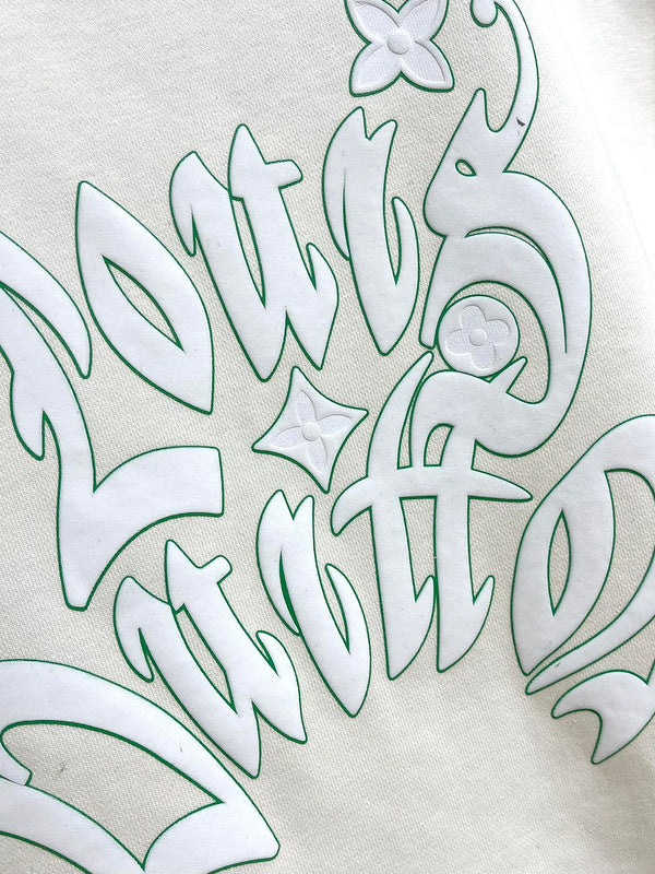 Side profile of Louis Vuitton luxury clothing with logo-detail design