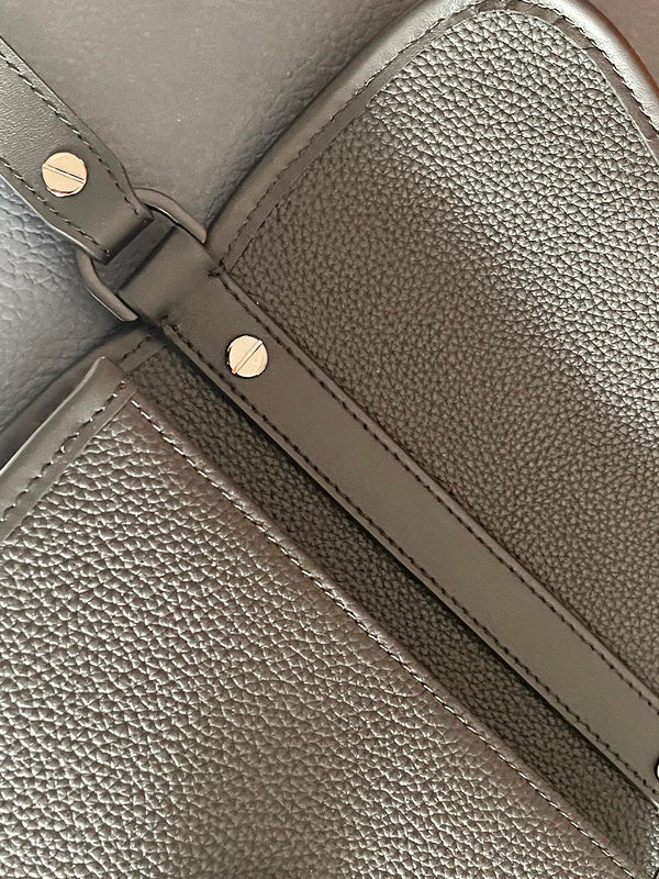 Handle and strap detail of elevated premium women's handbag – women's statement bag