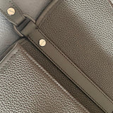Handle and strap detail of elevated premium women's handbag – women's statement bag