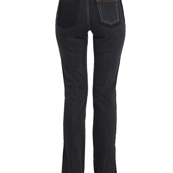 Close-up of Alexander McQueen pants hardware and fine stitching