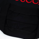 Front view of Gucci luxury clothing with contemporary cut