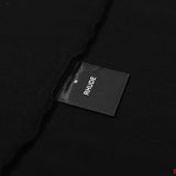 Close-up detail shot of Rhude luxury clothing with contemporary cut