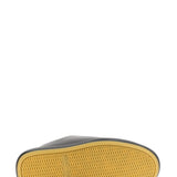 Close-up of Bottega Veneta athletic hardware and fine stitching