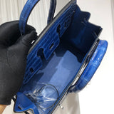Side view of sculpted structured handbag