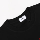 Side profile of Rhude luxury clothing with monogram-inspired silhouette