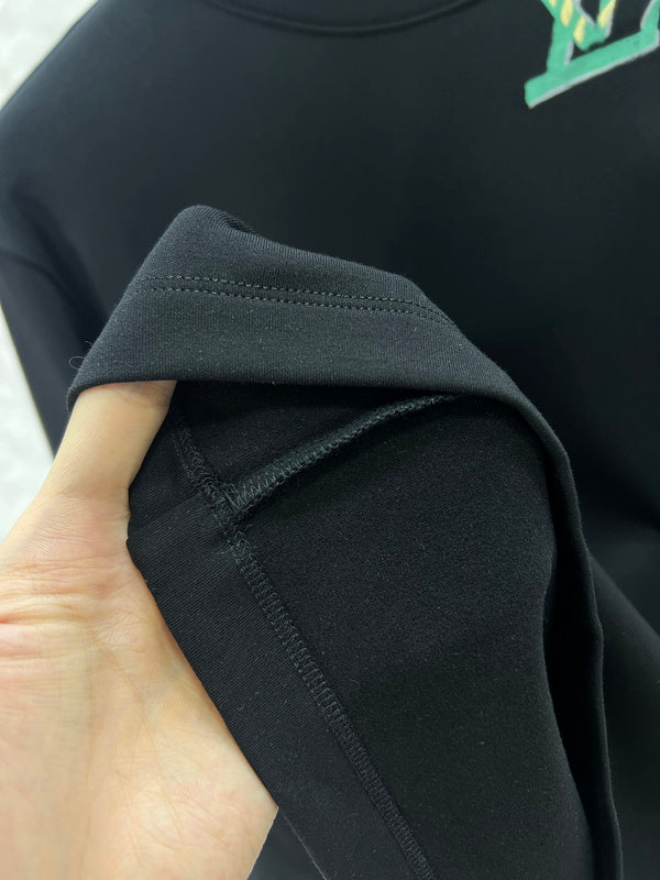 Side profile of Louis Vuitton luxury clothing with monogram-inspired silhouette