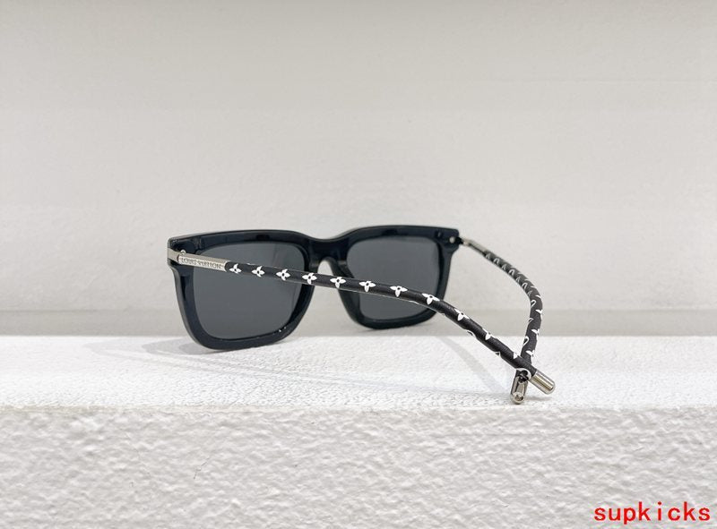 Close-up detail view of Louis Vuitton unisex sunglasses