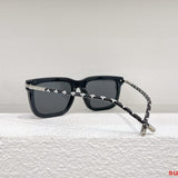 Close-up detail view of Louis Vuitton unisex sunglasses