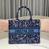 Handle and strap detail of everyday-luxe statement women's handbag – women's luxury handbag