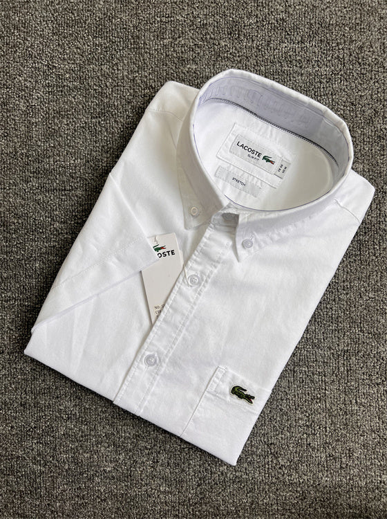 Side profile of Lacoste luxury clothing with logo-detail design