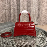 Styled lifestyle shot of premium polished women's handbag – women's luxury accessory