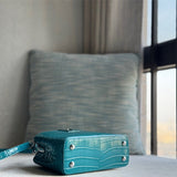 signature crossbody bag styled with outfit