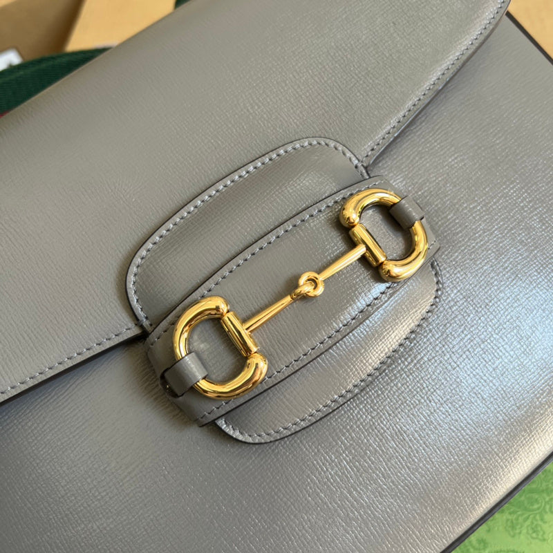 Handle and strap detail of everyday-luxe chic women's handbag – women's designer-style accessory