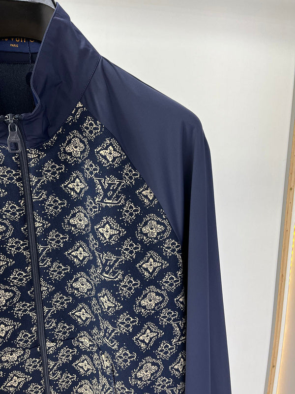 Full styled look of Louis Vuitton luxury clothing with label-forward styling